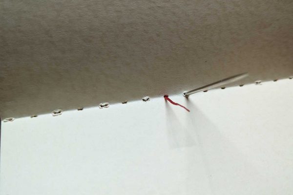 Stitching a softback notebook